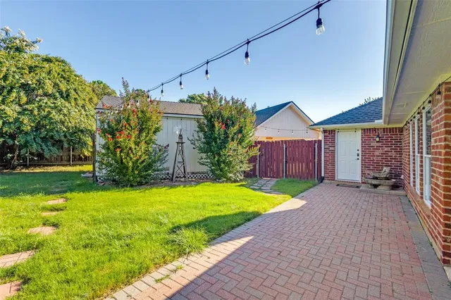 a view of a yard with an outdoor space