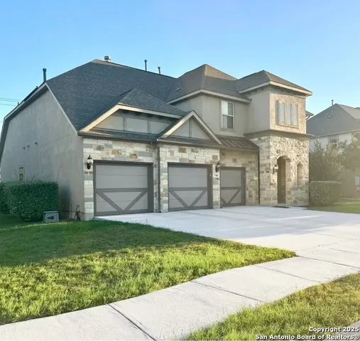 a view of front a house with a yard