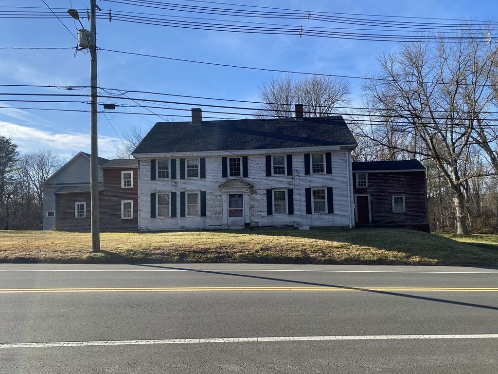 85 Main Street Groveland, MA 01834 - Photo 1 of 18 a view of a brick building next to a road