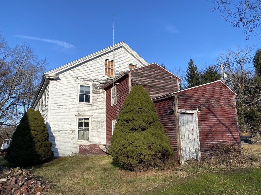 85 Main Street Groveland, MA 01834 - Photo 4 of 18 a view of a house with a yard