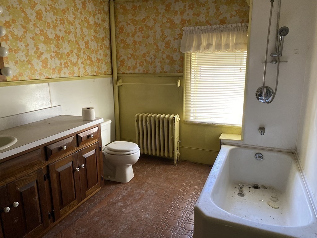 85 Main Street Groveland, MA 01834 - Photo 9 of 18 a bathroom with a sink and a bathtub