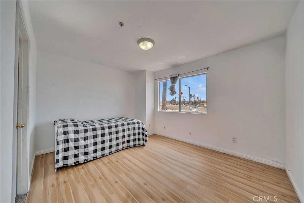 11320 Iris Lane El Monte, CA 91731 - Photo 11 of 14 a view of wooden floor and windows in a room