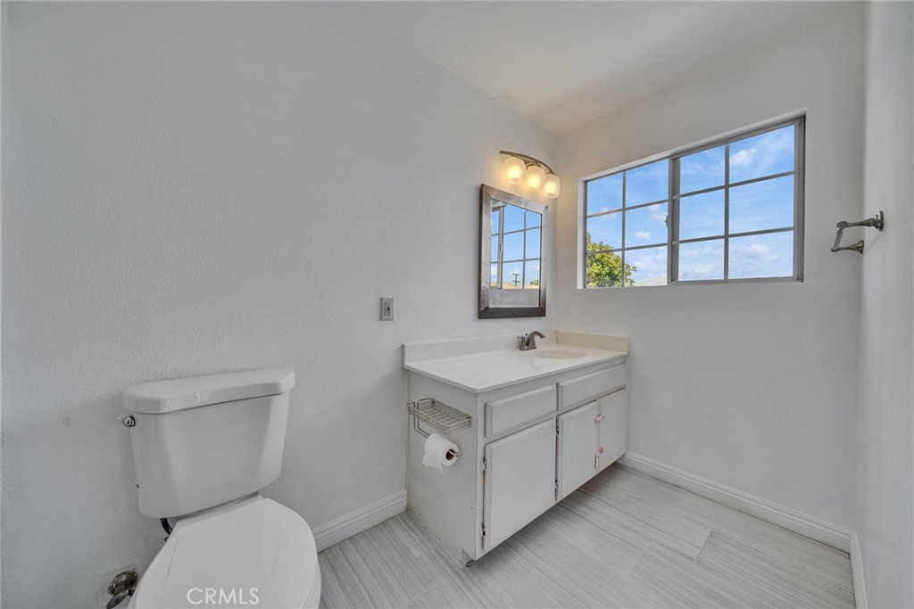 11320 Iris Lane El Monte, CA 91731 - Photo 12 of 14 a kitchen with a stove a sink and a window