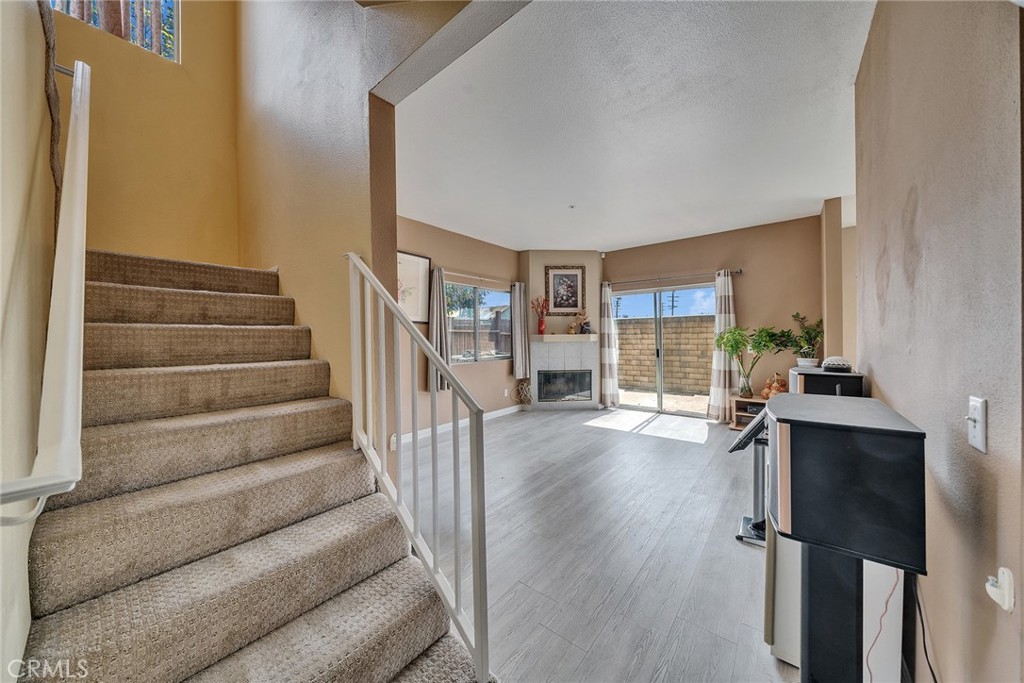 11320 Iris Lane El Monte, CA 91731 - Photo 4 of 14 a view of entryway and hall with wooden floor