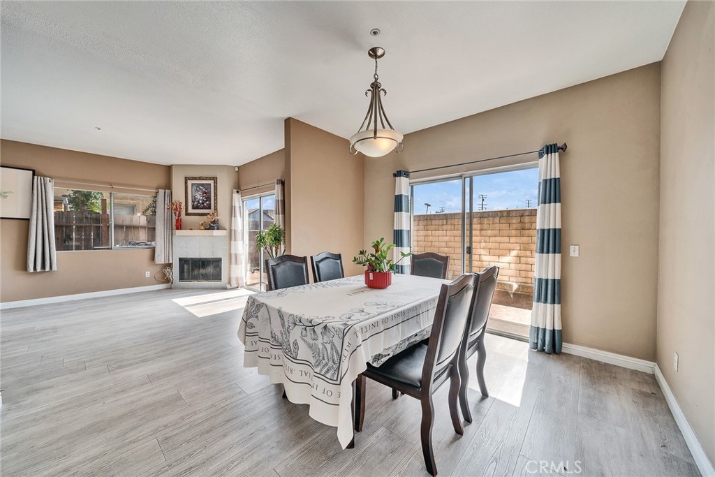 11320 Iris Lane El Monte, CA 91731 - Photo 5 of 14 a dining room with furniture window and wooden floor