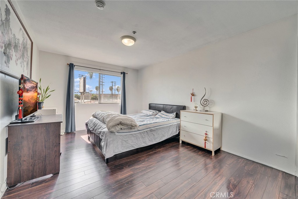 11320 Iris Lane El Monte, CA 91731 - Photo 7 of 14 a living room with furniture and a flat screen tv