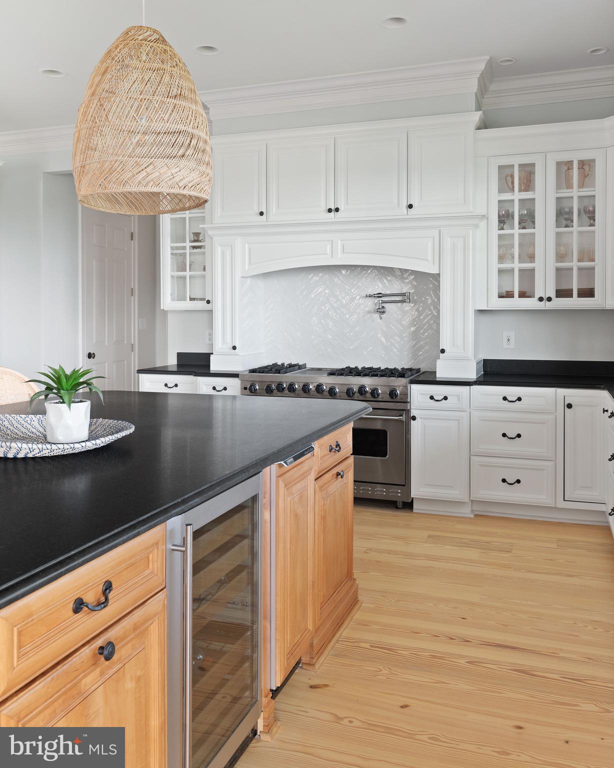 1932 Carrollton Road Annapolis, MD 21409 - Photo 14 of 134 Custom light fixtures, wine fridge, ice maker