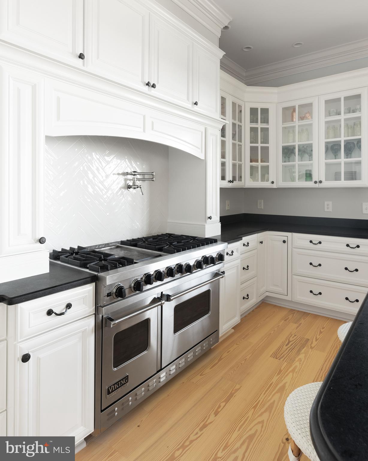 1932 Carrollton Road Annapolis, MD 21409 - Photo 15 of 134 Hand cut, herringbone tile backsplash viking range
