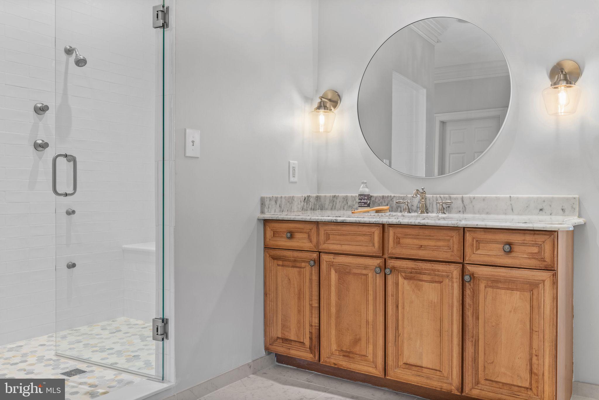 1932 Carrollton Road Annapolis, MD 21409 - Photo 54 of 134 Massive steam shower with custom tile; glass door