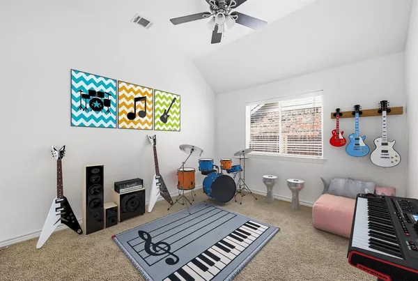 a living room with furniture rug and window