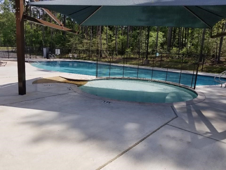28605 Beechnut Court Oakhurst, TX 77359 - Photo 10 of 12 a view of a backyard of the house