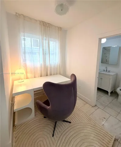 a living room with a couch and a table