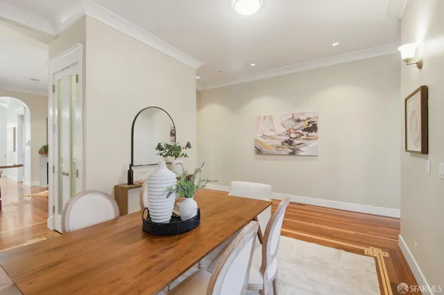 a bedroom with two beds and a window