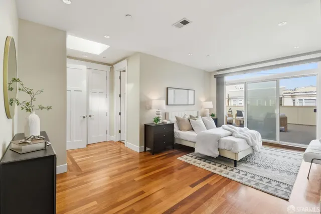 an aerial view of residential house with outdoor space and seating area