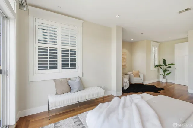 an aerial view of a house with a mountain view
