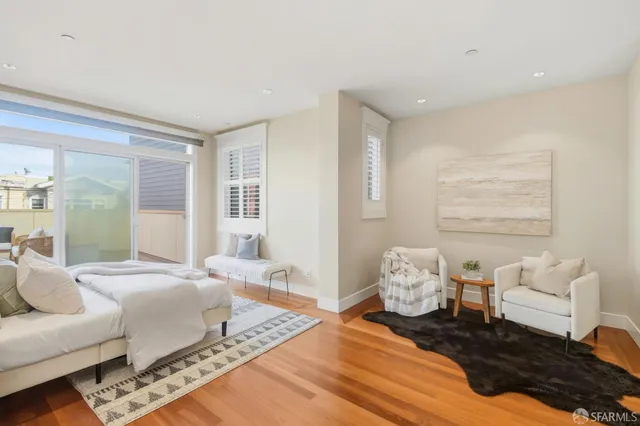 an aerial view of a house with outdoor space