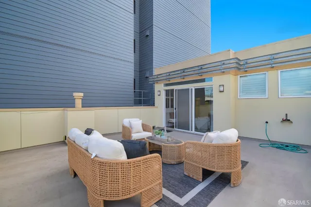 a living room with furniture and a table