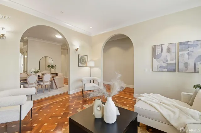 a view of a livingroom with furniture and a fireplace