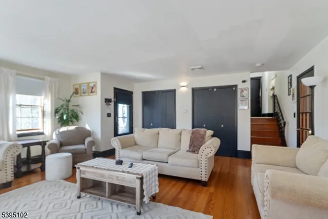 a living room with furniture and a couch