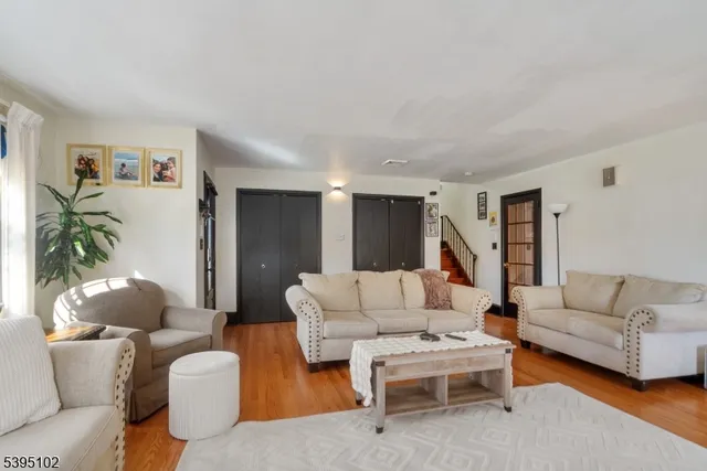 a living room with furniture and a couch