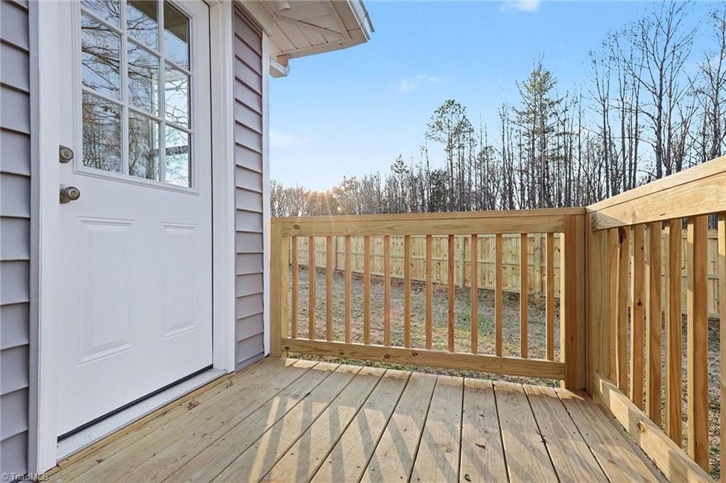122 Old Fisher Ferry Road Thomasville, NC 27360 - Photo 15 of 20 Side deck and privacy fence