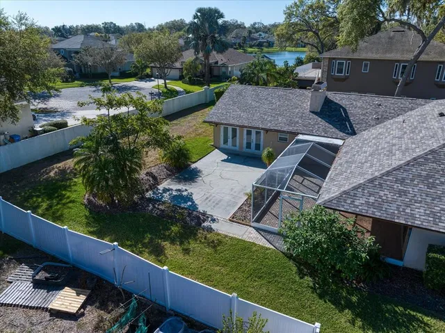 an aerial view of a house with a garden