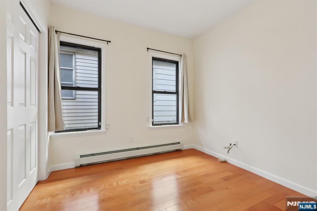 32 Hudson Terrace, Unit 2 Edgewater, NJ 07020 - Photo 19 of 42 a view of an empty room with a window