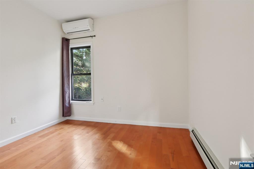 32 Hudson Terrace, Unit 2 Edgewater, NJ 07020 - Photo 23 of 42 an empty room with a window