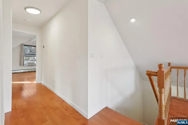 a view of a hallway with workspace