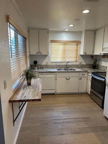 2905 Niagara, Unit 171 Turlock, CA 95382 - Photo 4 of 10 a kitchen with stainless steel appliances granite countertop a sink stove and cabinets
