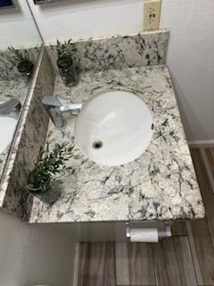 2905 Niagara, Unit 171 Turlock, CA 95382 - Photo 5 of 10 a bathroom with a sink and mirror