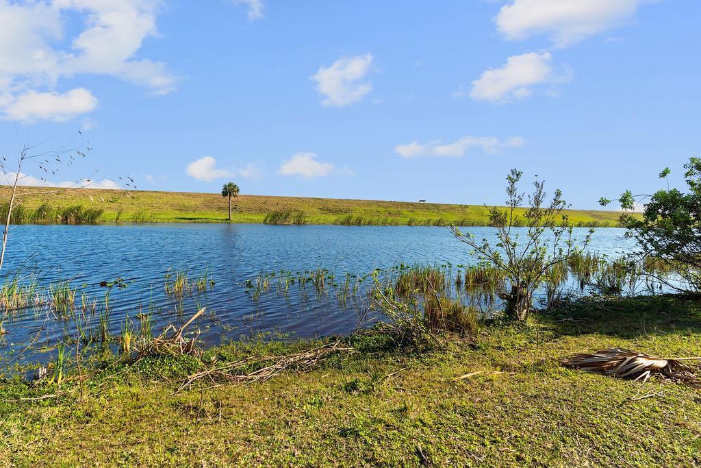 1493 Hunter Road Okeechobee, FL 34974 - Photo 8 of 10 Hunter Road Canal View