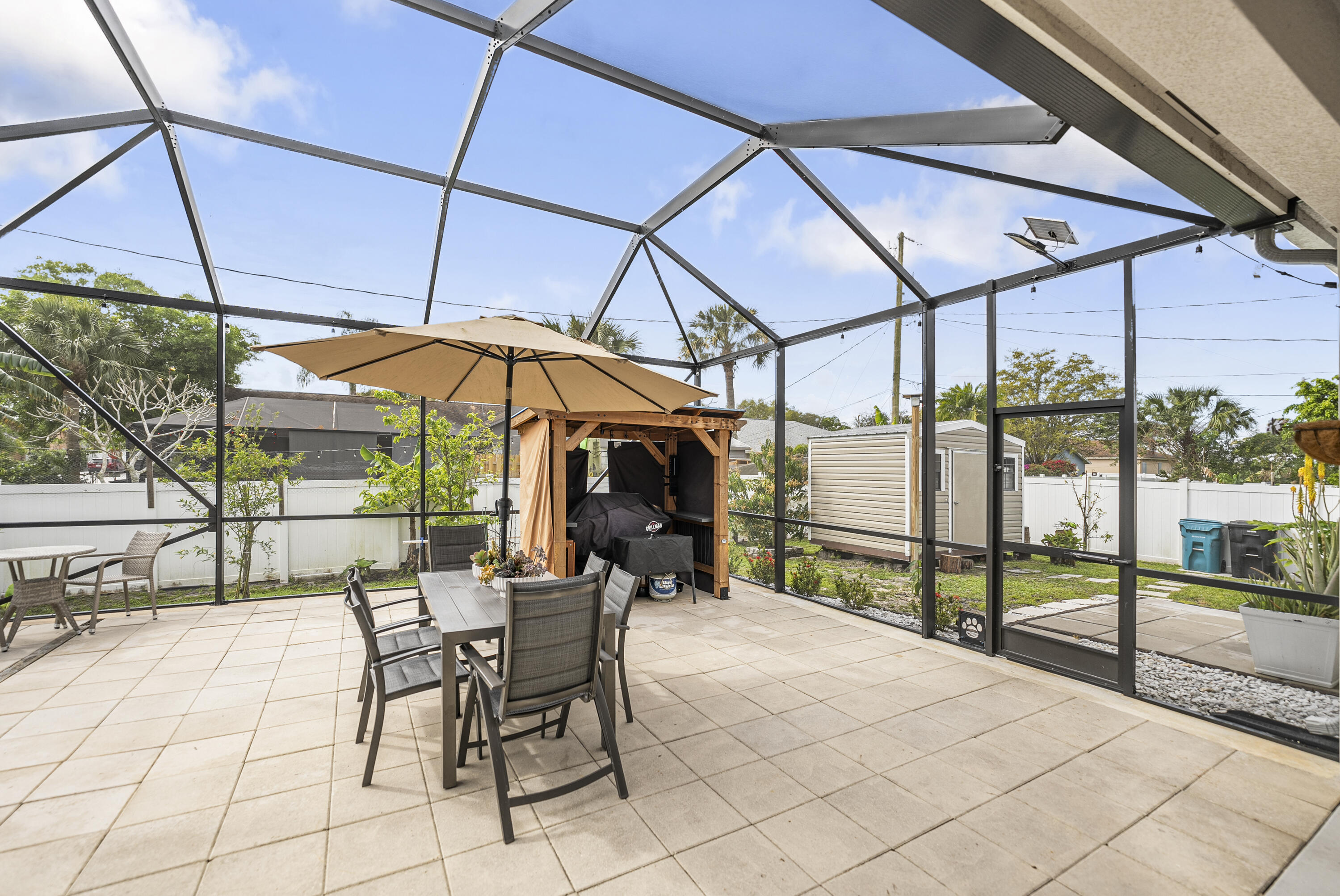 1212 Southwest Herald Road Port St. Lucie, FL 34953 - Photo 41 of 65 Screened Patio