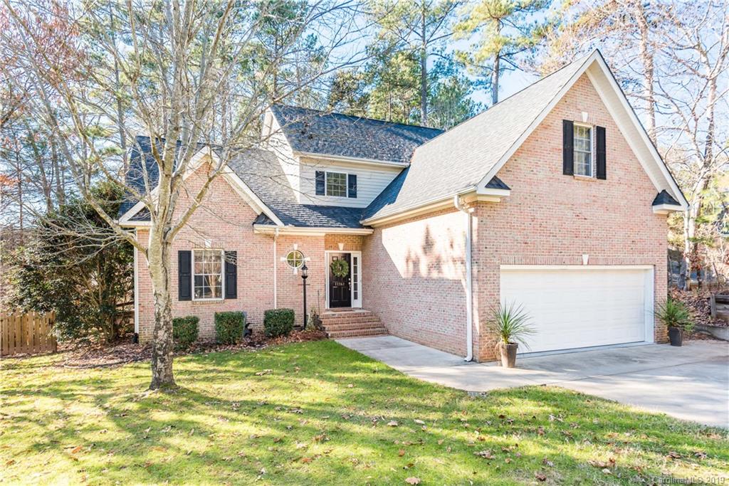 11161 Watertrace Drive Tega Cay, SC 29708 - Photo 1 of 24 a front view of a house with a yard