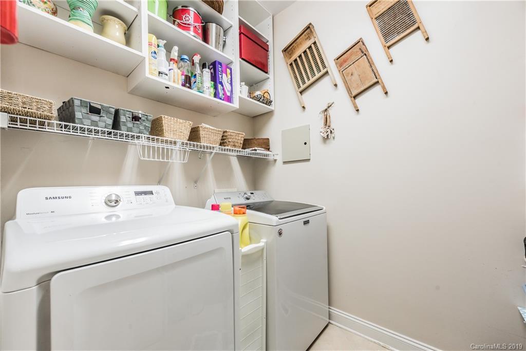 11161 Watertrace Drive Tega Cay, SC 29708 - Photo 13 of 24 a utility room with dryer and washer