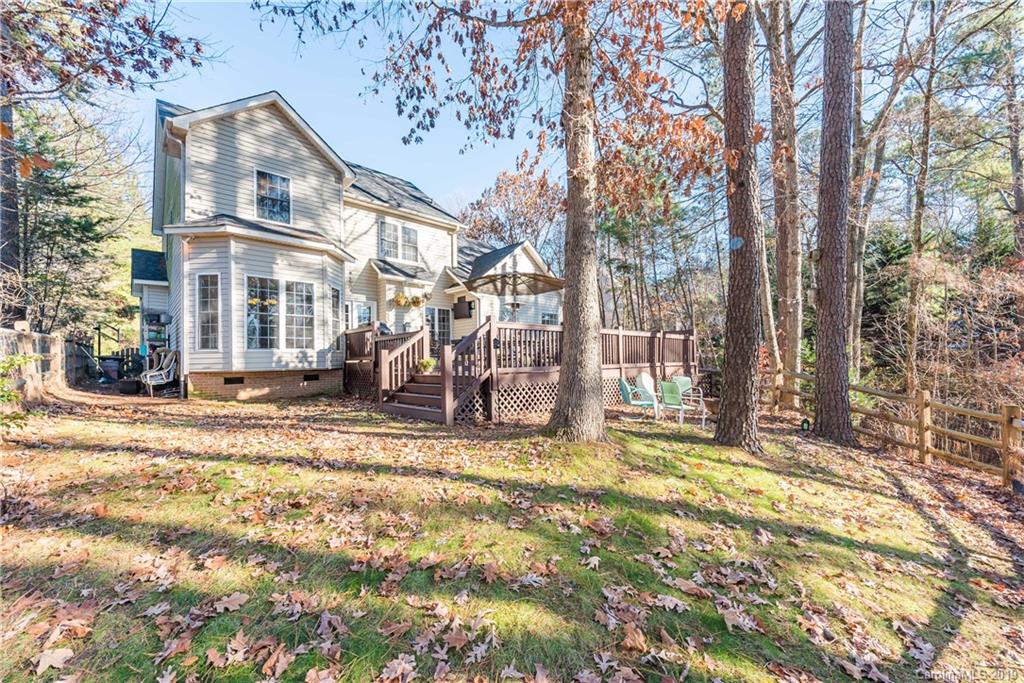 11161 Watertrace Drive Tega Cay, SC 29708 - Photo 24 of 24 a view of a house with a large tree