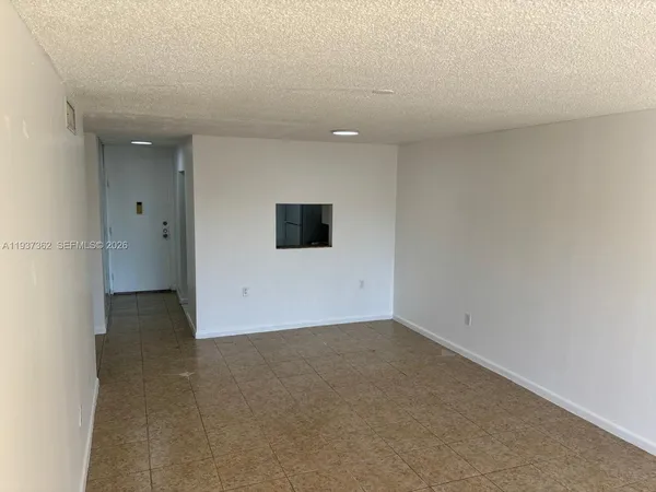 a view of a livingroom with an empty space