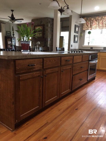 13848 Elmwood Court Stapleton, AL 36578 - Photo 6 of 27 You will enjoy this big Breafast Bar/ Island with extra cabinets and service areas.
