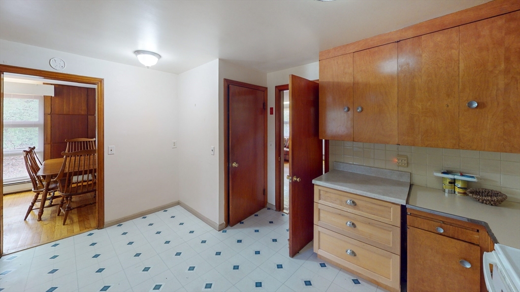 116 Lincoln Road Wayland, MA 01778 - Photo 6 of 26 a bedroom with a bed and furniture