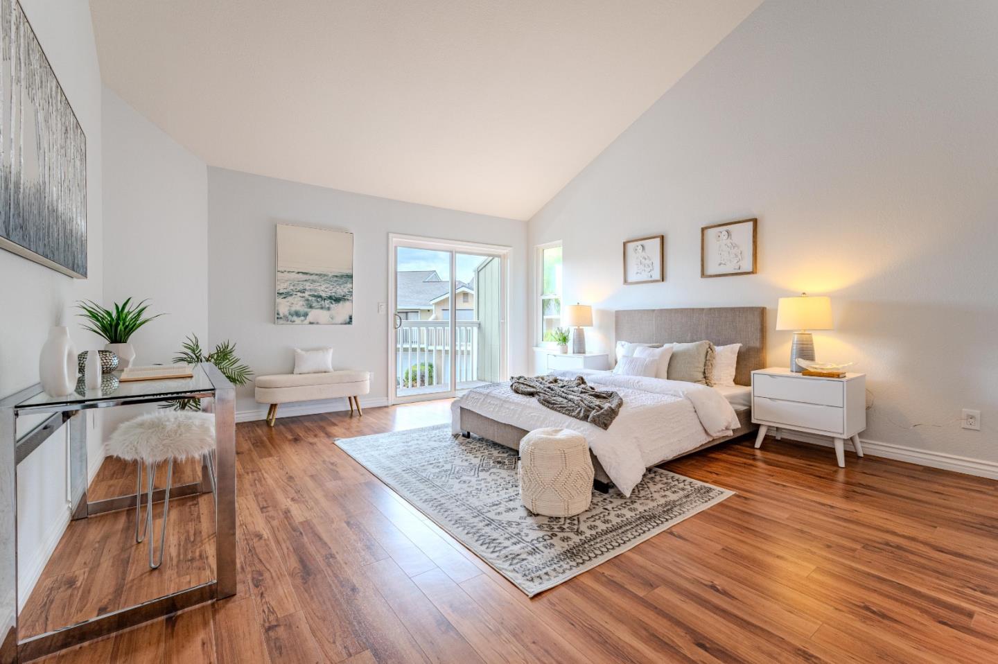 99 Jacklin Court Milpitas, CA 95035 - Photo 13 of 25 a bedroom with a bed and wooden floor