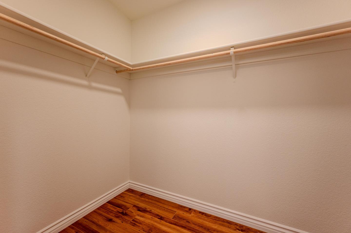 99 Jacklin Court Milpitas, CA 95035 - Photo 17 of 25 a view of a room with racks on the wall