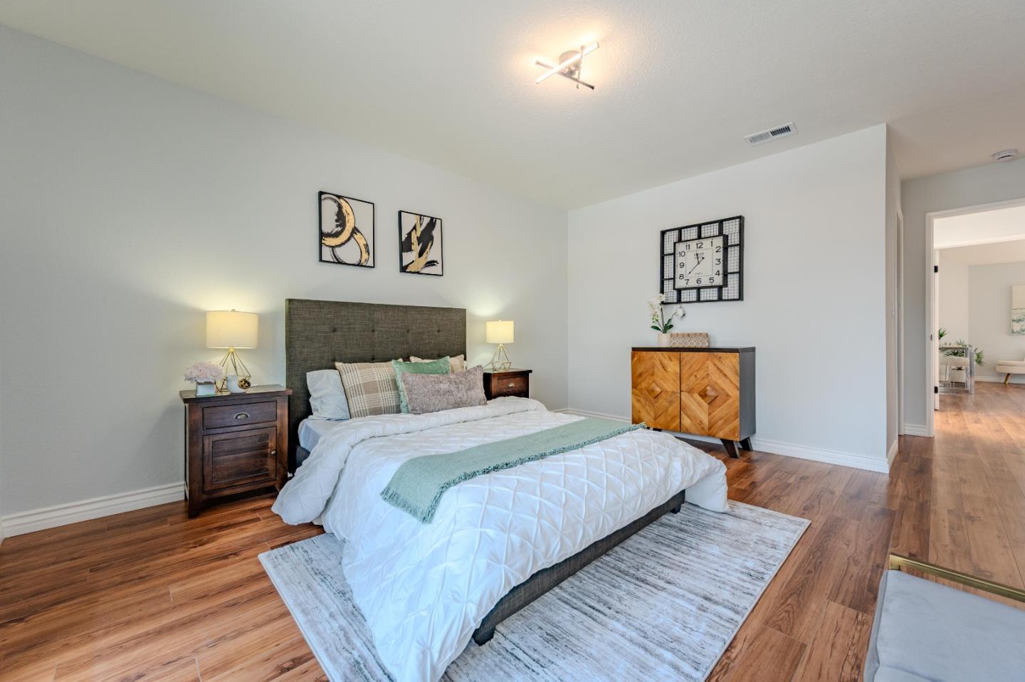 99 Jacklin Court Milpitas, CA 95035 - Photo 19 of 25 a bedroom with a bed and wooden floor