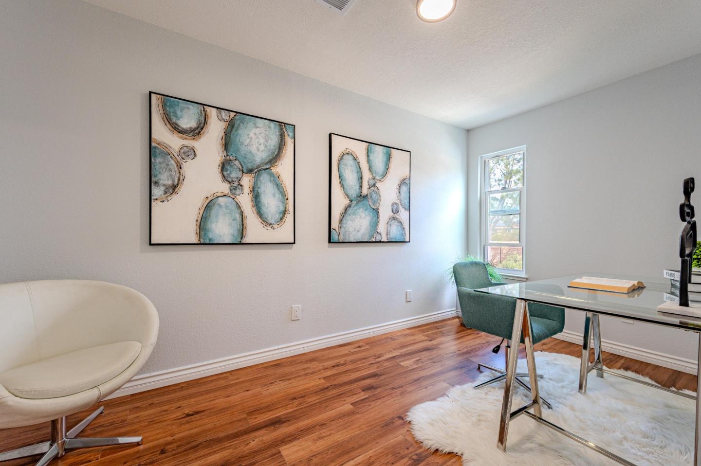 99 Jacklin Court Milpitas, CA 95035 - Photo 21 of 25 a workspace with furniture and a window