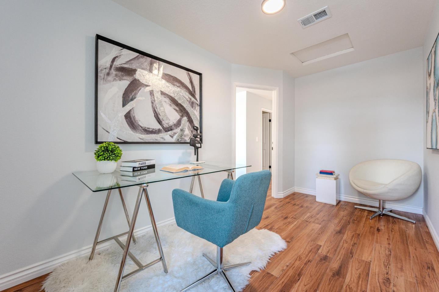 99 Jacklin Court Milpitas, CA 95035 - Photo 22 of 25 a living room with furniture and a wooden floor
