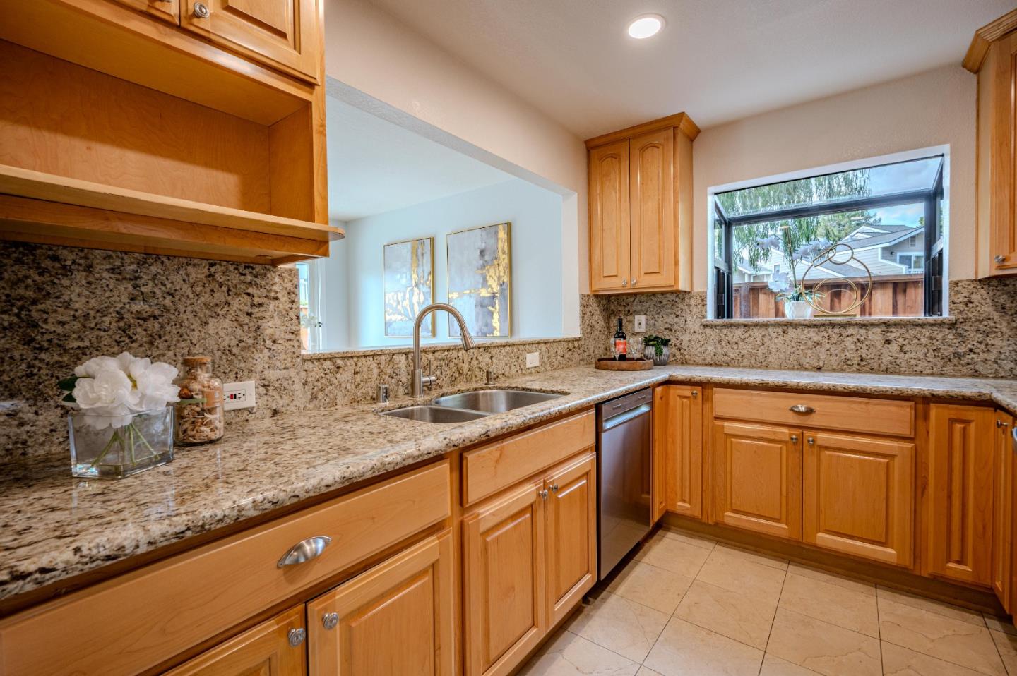99 Jacklin Court Milpitas, CA 95035 - Photo 9 of 25 a kitchen with granite countertop sink and cabinets