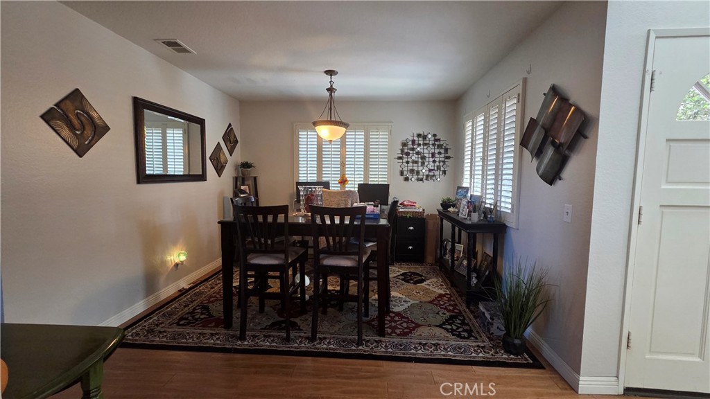 4 Leesburg Irvine, CA 92620 - Photo 12 of 18 a dining room with furniture and window