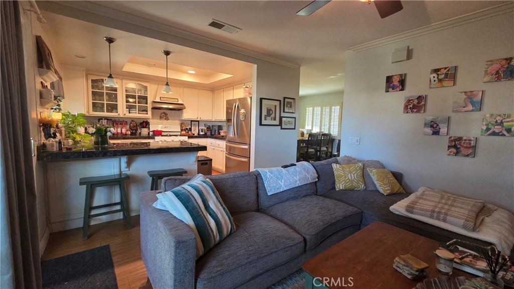 4 Leesburg Irvine, CA 92620 - Photo 9 of 18 a living room with furniture and a couch