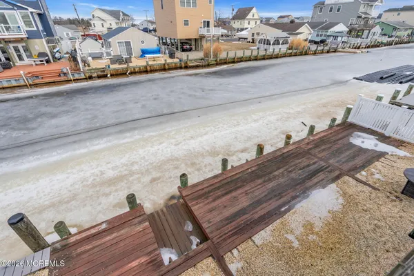 a view of a balcony with chairs