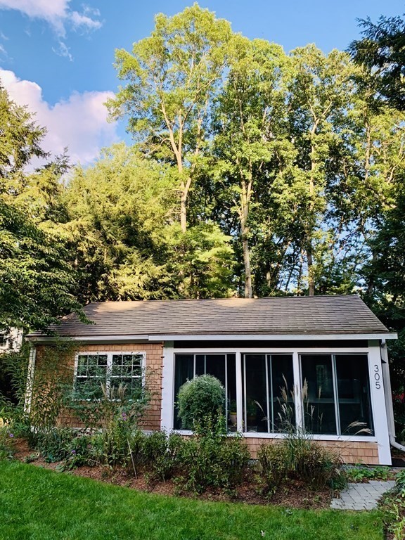 305 Potter Road Framingham, MA 01701 - Photo 1 of 21 front view of house with a yard