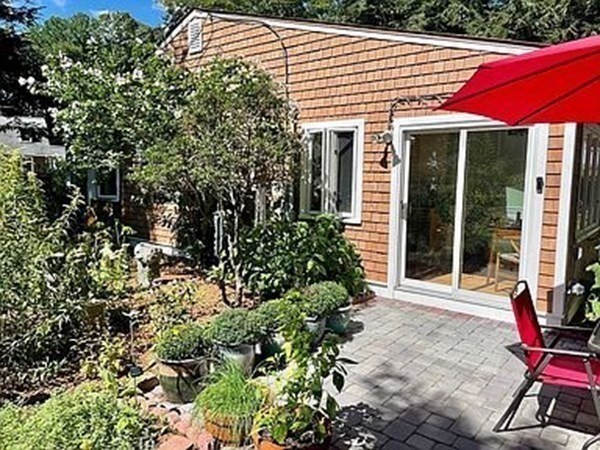 305 Potter Road Framingham, MA 01701 - Photo 14 of 21 a view of a house with a patio